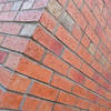 Close up corner of a building made with Queens Blend bricks