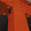 Close up of metal beams painted with Red Oxide Metal Primer
